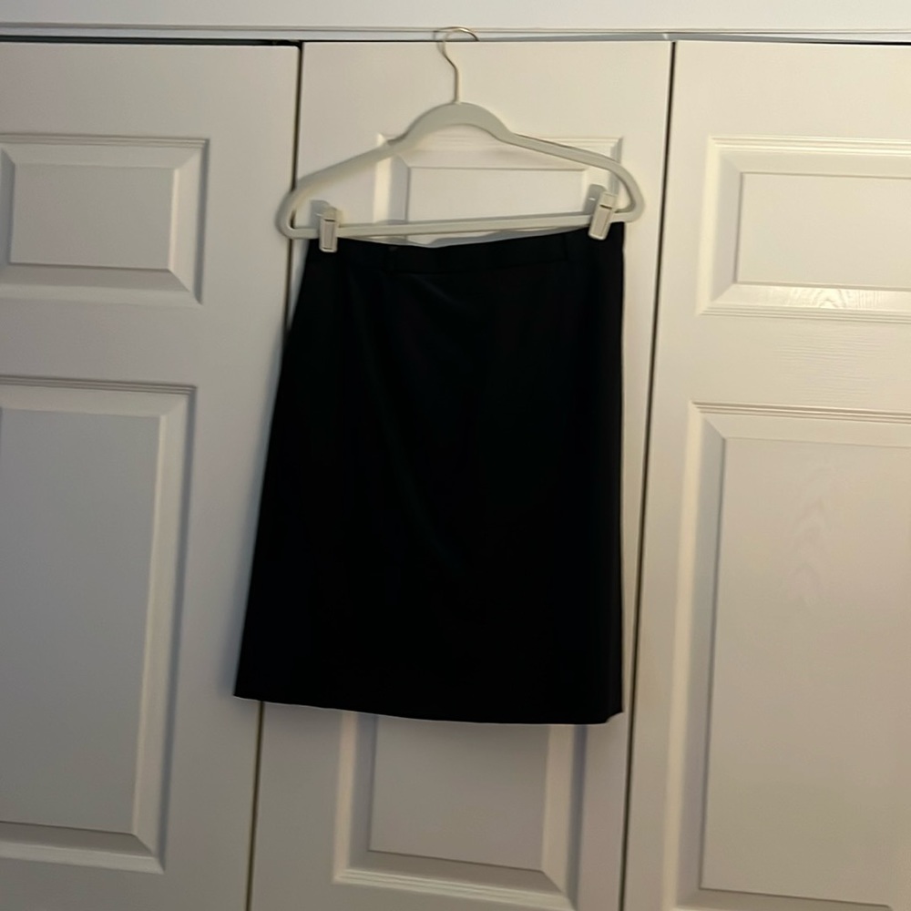 Talbots black pencil skirt size 14. Generous room. Wool fully lined.
